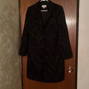 Women’s black dress coat.